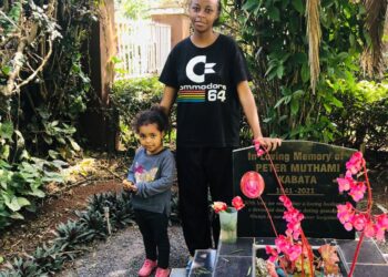 Me and my sister visiting our grandpa grave