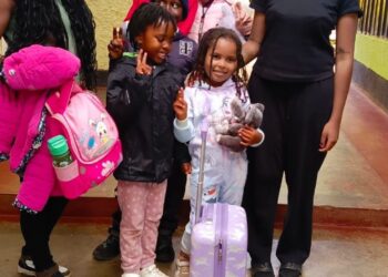 Me, my baby sister and kids from her school