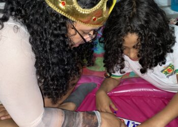 Playing board games and having fun together.